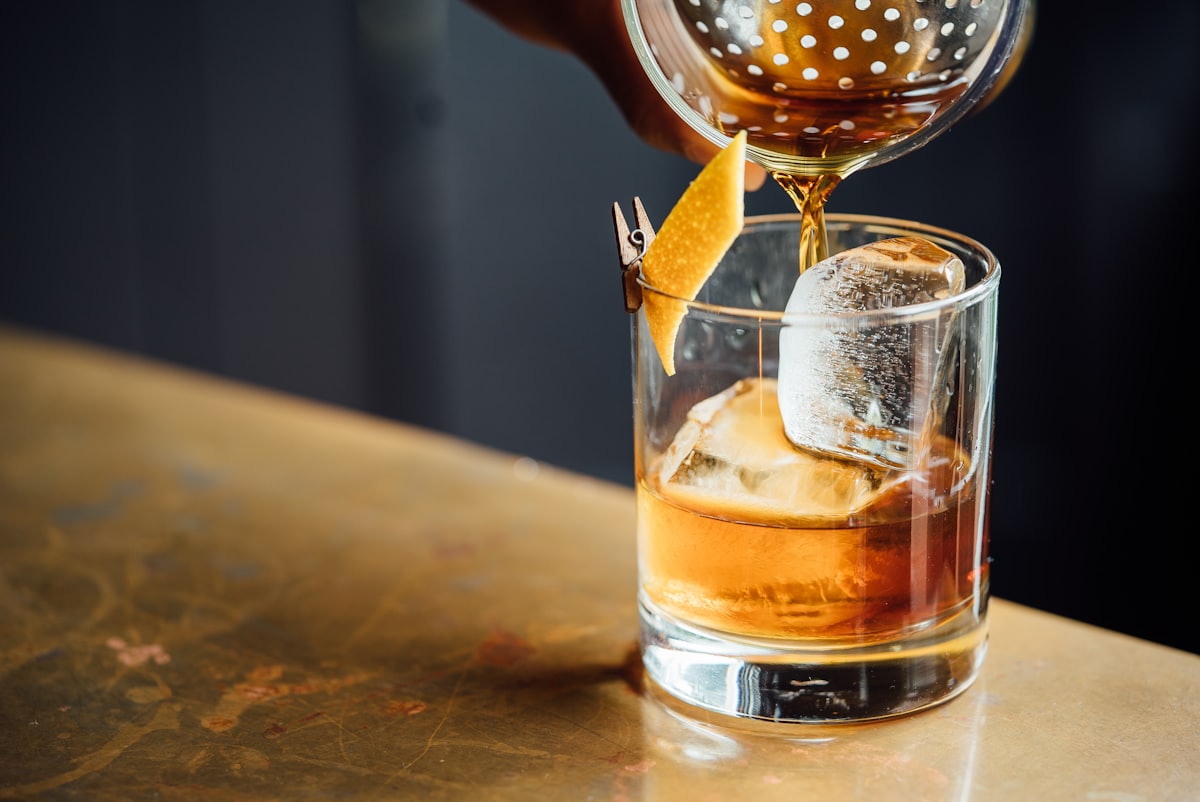 bar counter with drinks - a Sleep, Finally guide to Social Drinking vs Self-Medication: Which Is Yours