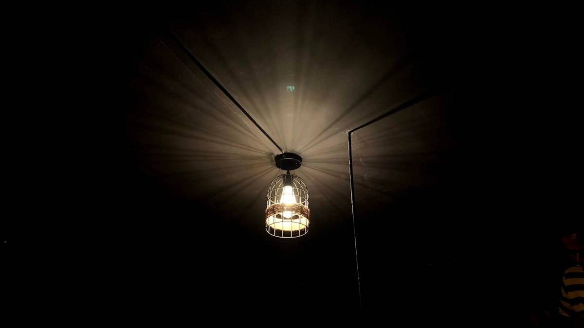 a light from a ceiling — a Sleep, Finally guide to Why Even Small Lights Can Disrupt Your Sleep