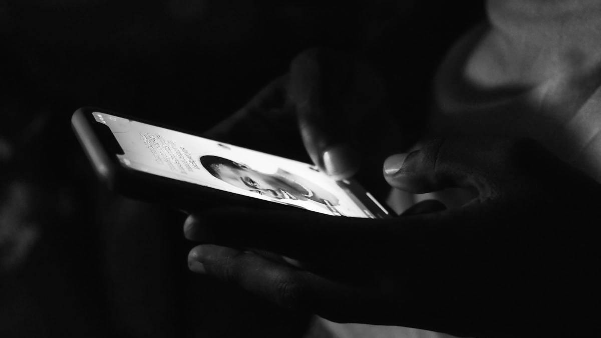 a person holding a phone — a Sleep, Finally guide to Why Screen Content Keeps You Awake More Than the Light