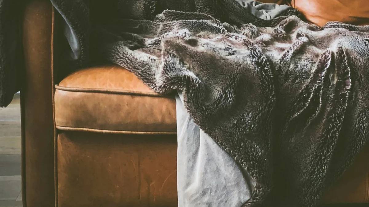 brown leather sofa — a Sleep, Finally guide to Why Some People Get Sleepy Under Stress and Others Don't