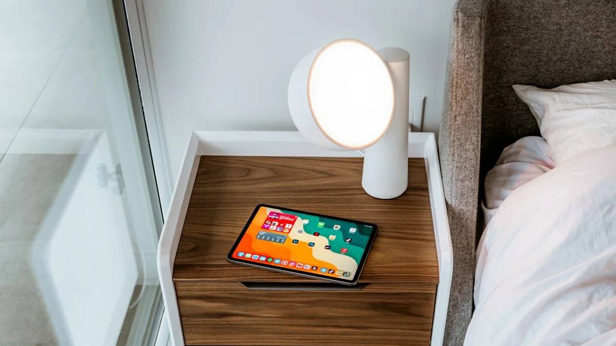 a bedside table with a phone on top of it — a Sleep, Finally guide to Why We Reach for Phones When We Can't Sleep