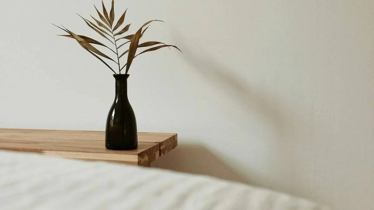 brown and green plant on brown wooden table — a Sleep, Finally guide to why your bedroom should be for sleep only